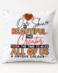 Decorative pillow with Our Skin Is Beautiful print